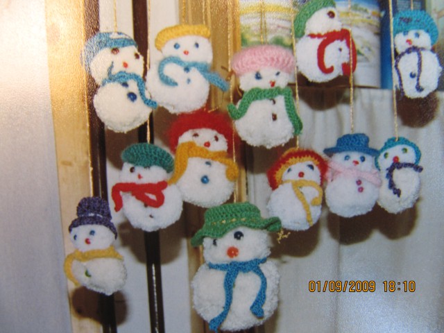 še enkrat snežaki z drugimi kapami