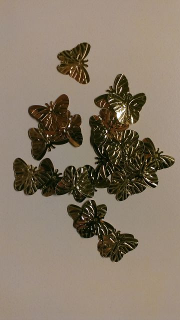 20 zlatih metuljčkov