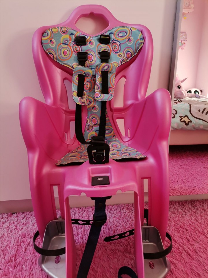 Otroški sedež za kolo v roza barve 30€ - foto povečava