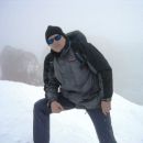 v ozadju(cca.100m) do vrha Marmolade/Dolomiti 3.3.07