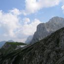 Kamniško sedlo in Planjava, v ozadju Krofička in Ojstrica (delno v megli)