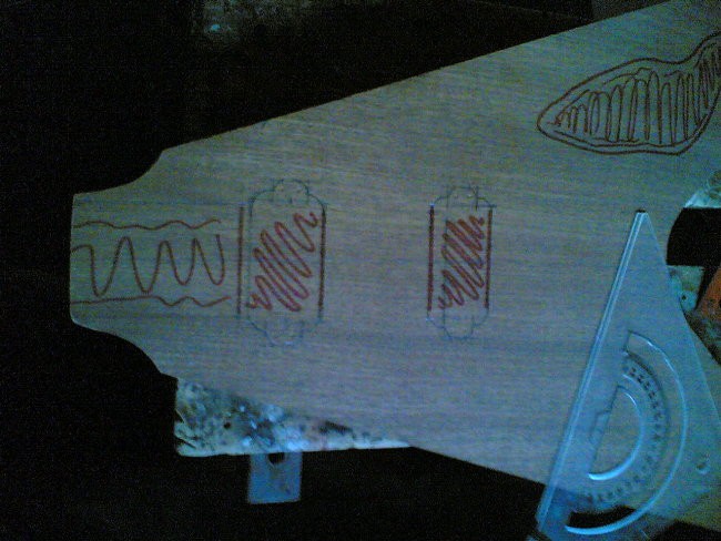 drawing and measuring holes for the pickups and neck